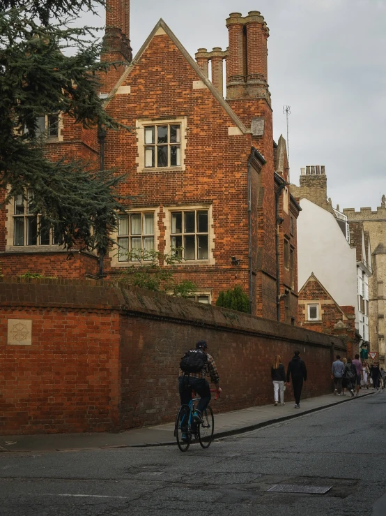 a person is on a bicycle down a city street