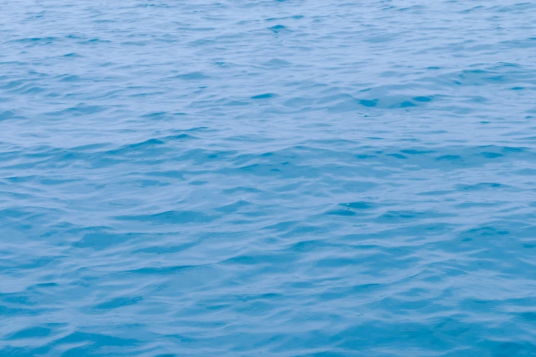 an airplane flying over a body of water