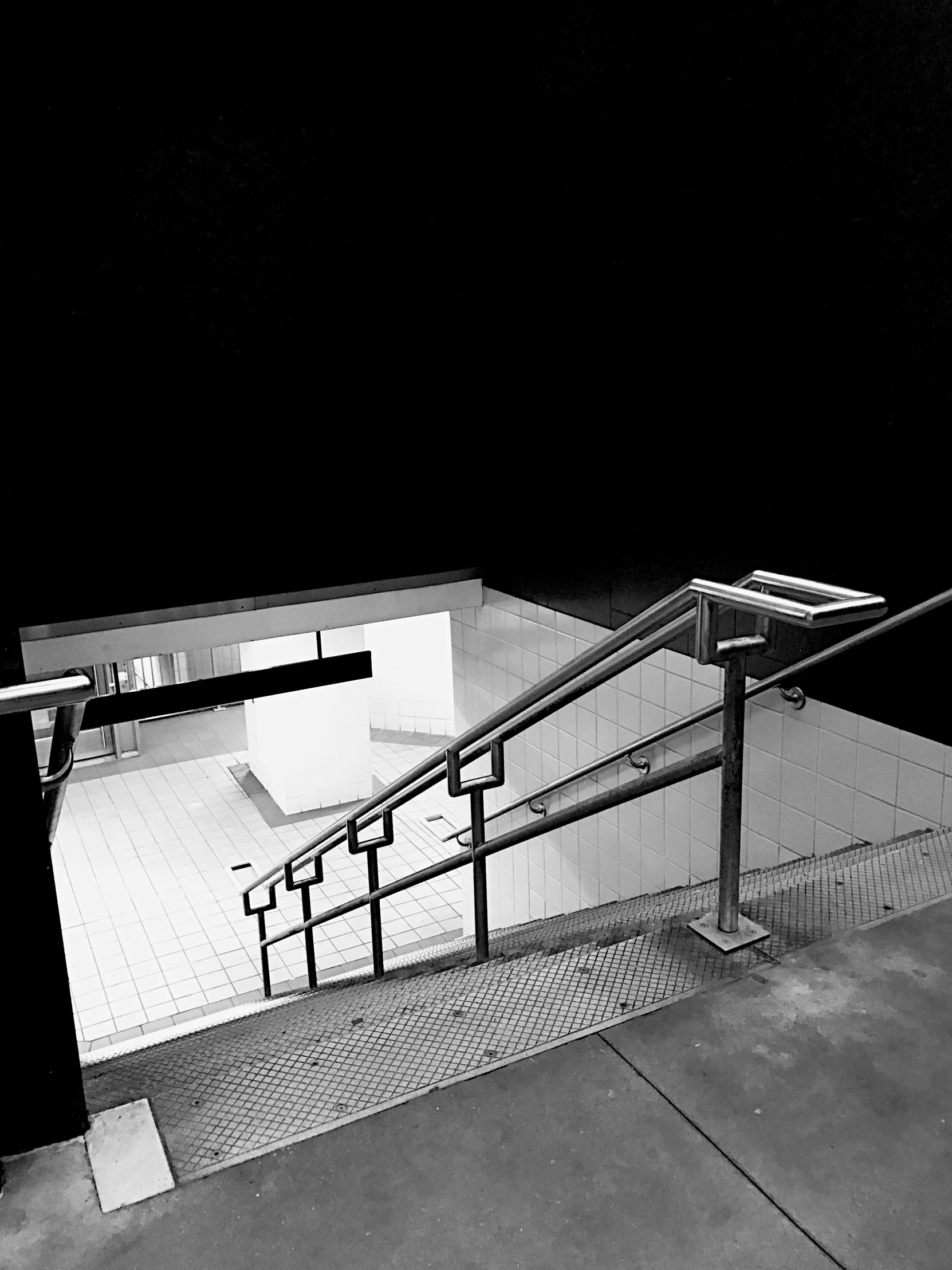 a black and white pograph of an empty station