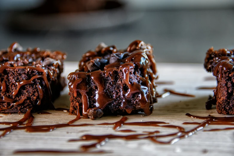 pieces of chocolate cake with drizzle and dark chocolate