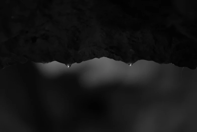 drops of water are falling out of the cave