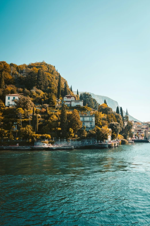 a river with houses and boats in it