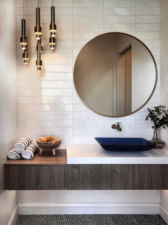 bathroom area with white and gray tiled walls, grey and white mosaic wall