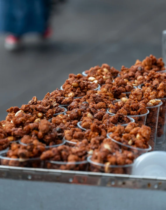 a bunch of food is being served by people