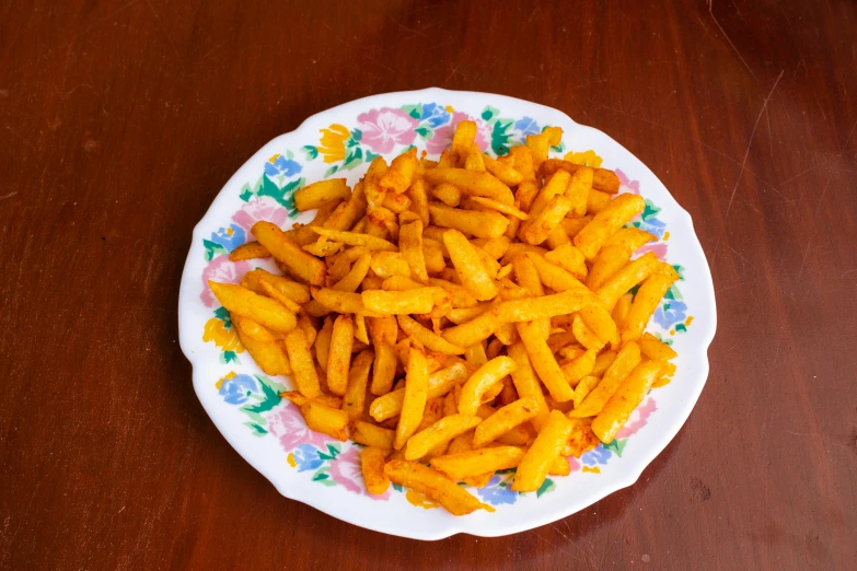 some very tasty looking french fries on a plate