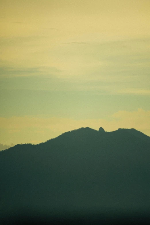 a view of the mountains at dusk taken from a helicopter