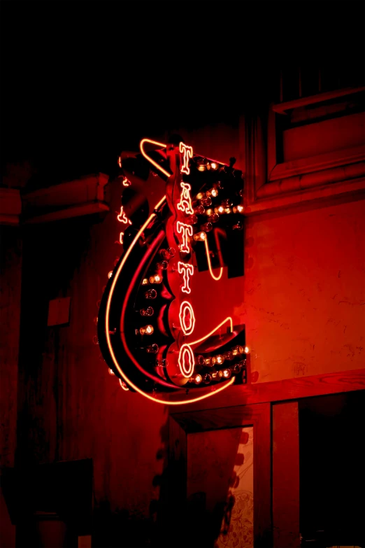 neon signs on the side of the building