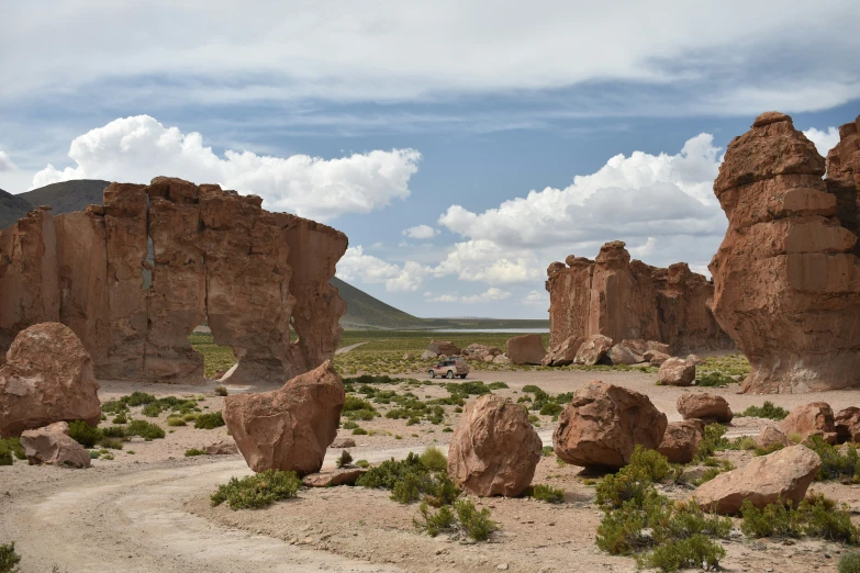 a desert area with several large rocks