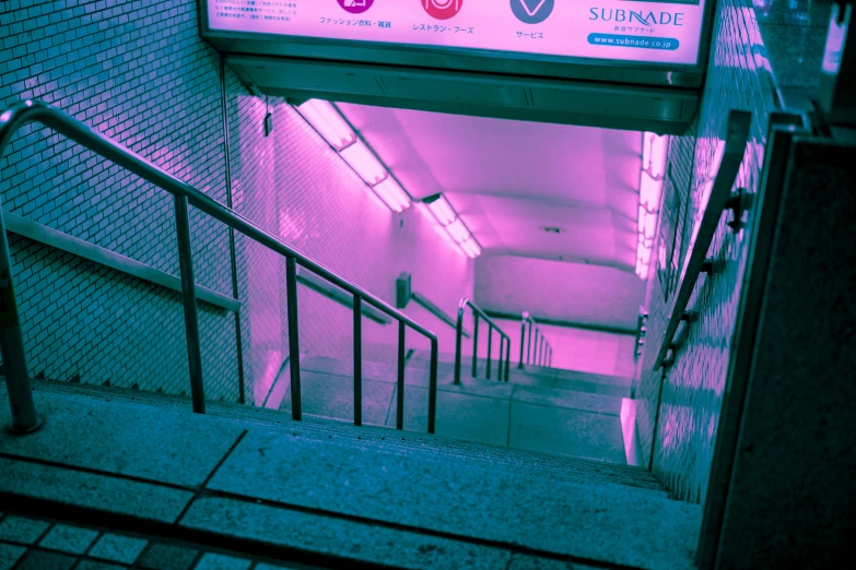 staircase and stairs leading to pink light in the building