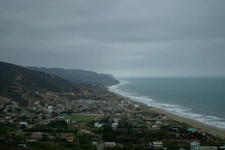 a large body of water on the side of a hill