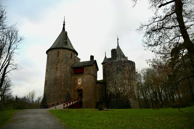 an old castle built on top of a hill