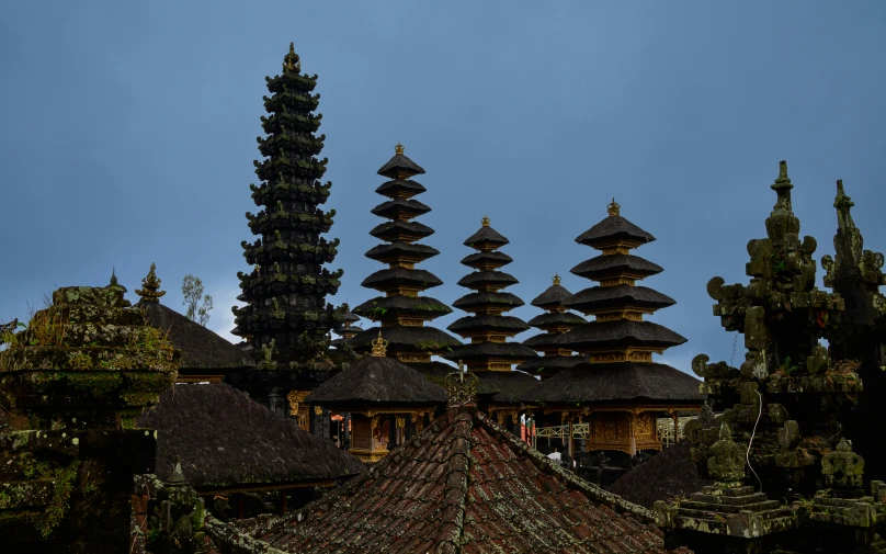 an old building with many towers in the background