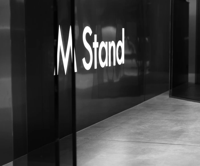 a black and white po of the m stand logo