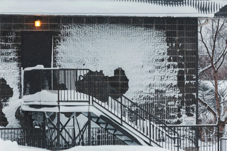 the windows are covered with snow and rain