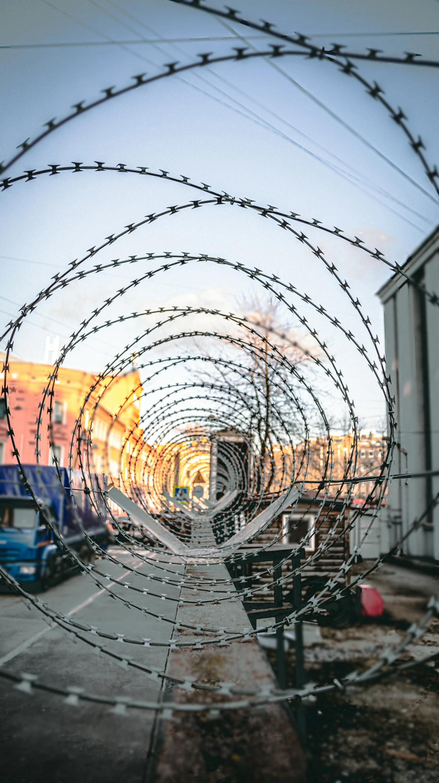 a close up of a barbed wire fence