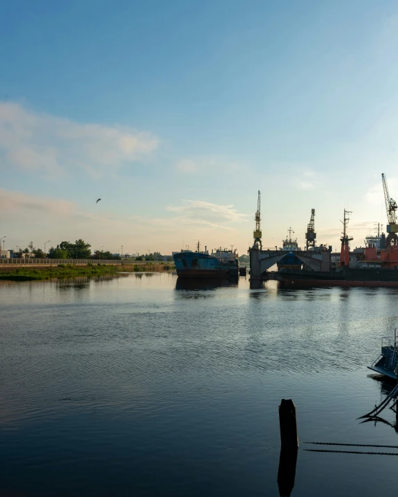 several boats in the water near some docks