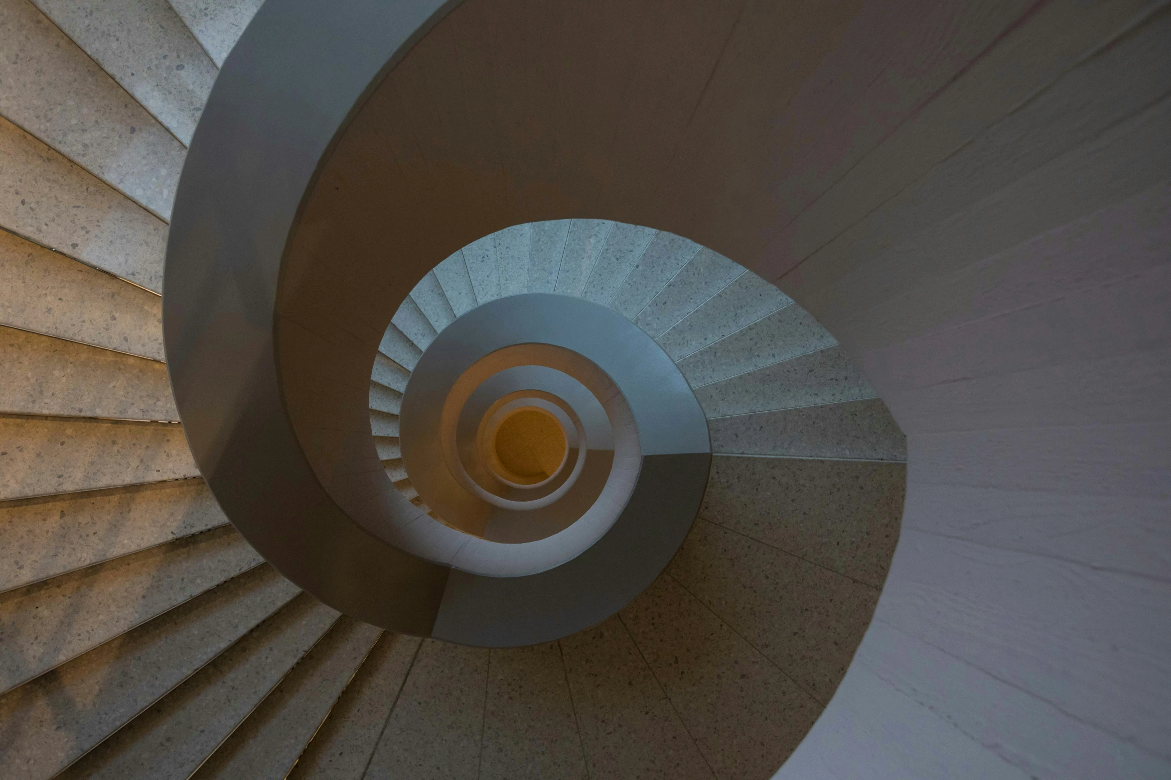 a spiral staircase at the top of a building