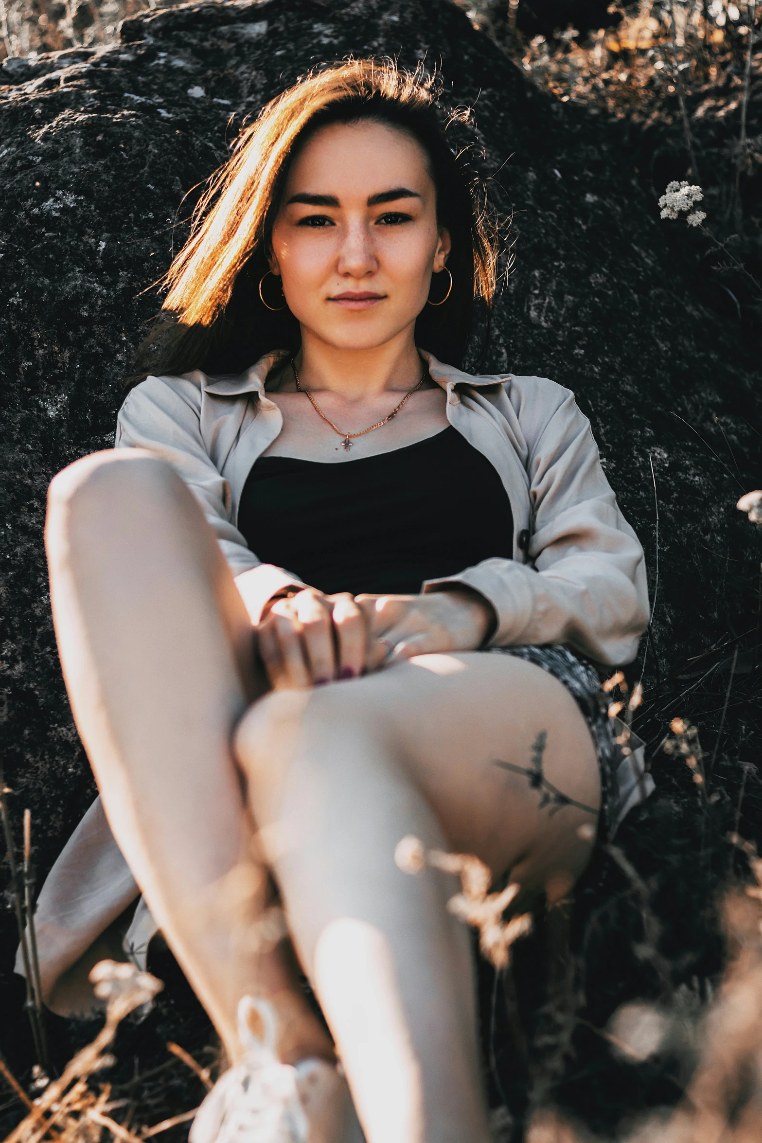 an image of a girl sitting on the ground