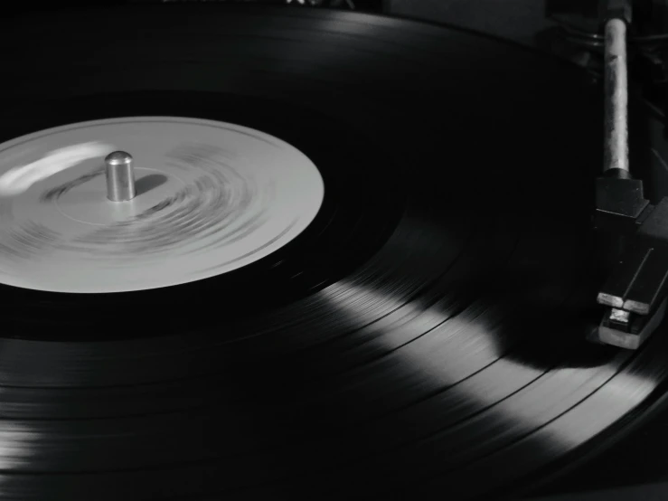 there is a record player sitting on top of a table