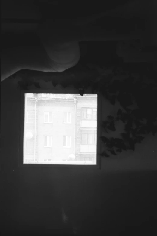 a black and white image of an open window