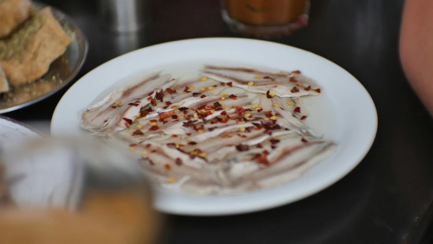 small ers on a white plate with confetti toppings