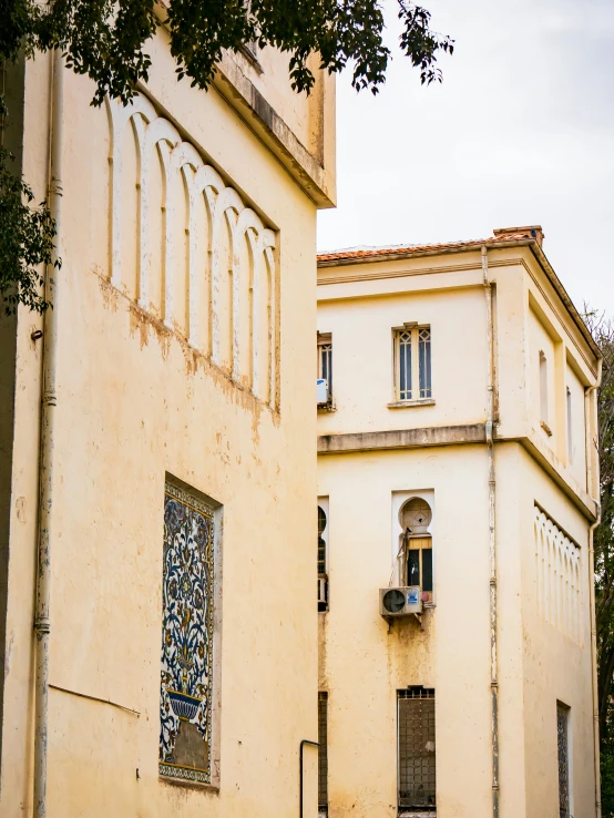 the old building has intricate glass and wrought iron on it