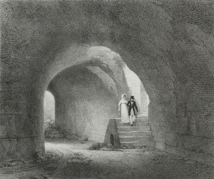 a person is walking up the stairs to a tunnel