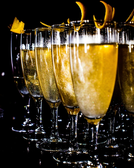 a table filled with lots of glasses filled with drinks