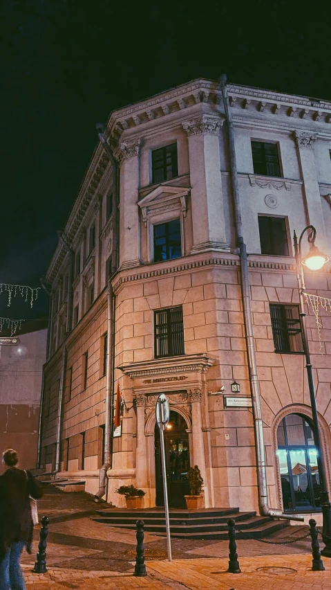 a building at night lit up with bright lights