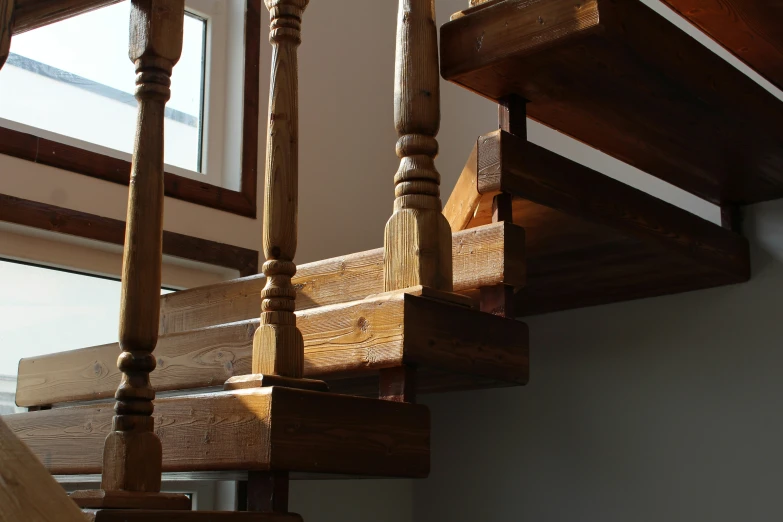 some kind of wooden rail attached to a ceiling