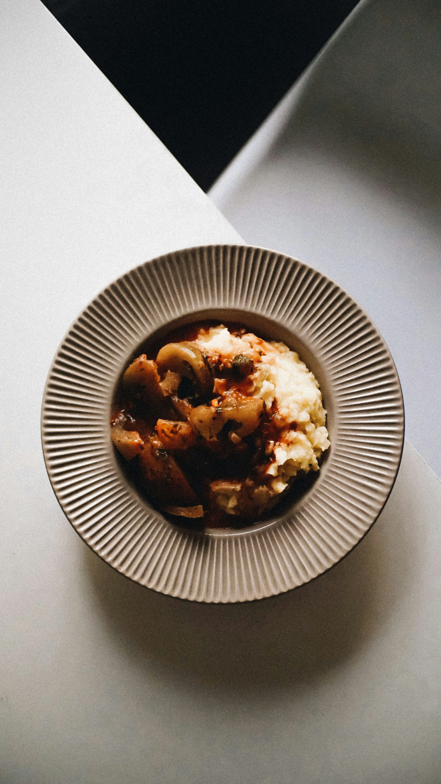 the food in the bowl is prepared and ready to be eaten