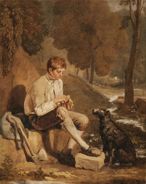 a man sitting on top of a stone wall