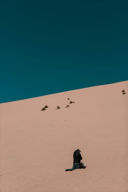 the backpack is on top of the mountain