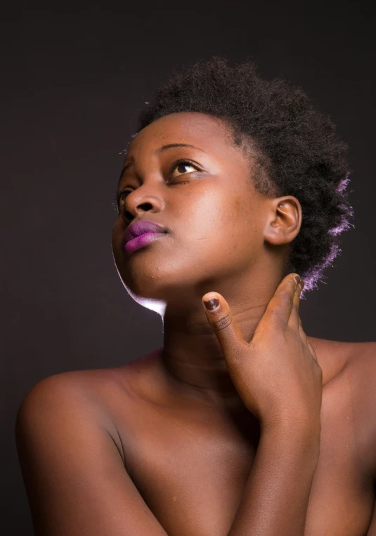 a  woman with pink lipstick poses for the camera