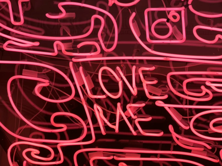 neon sign saying some girls are sweet as candy