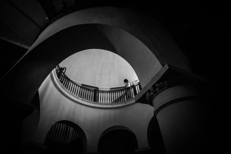 a balcony and a staircase view up