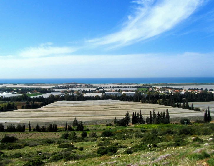 an overview of a landscape and blue skies