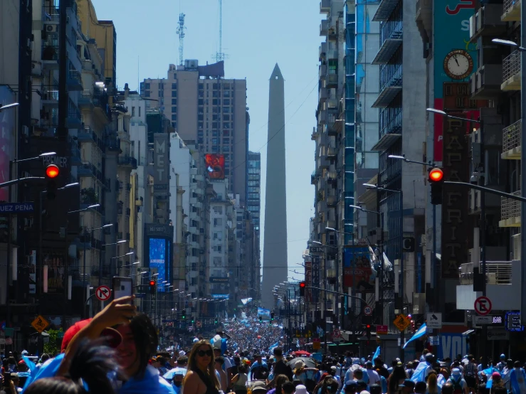 this is a picture of people walking on the streets