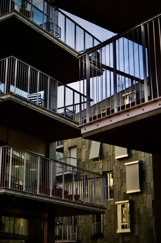 two balconies and a walkway to another balcony