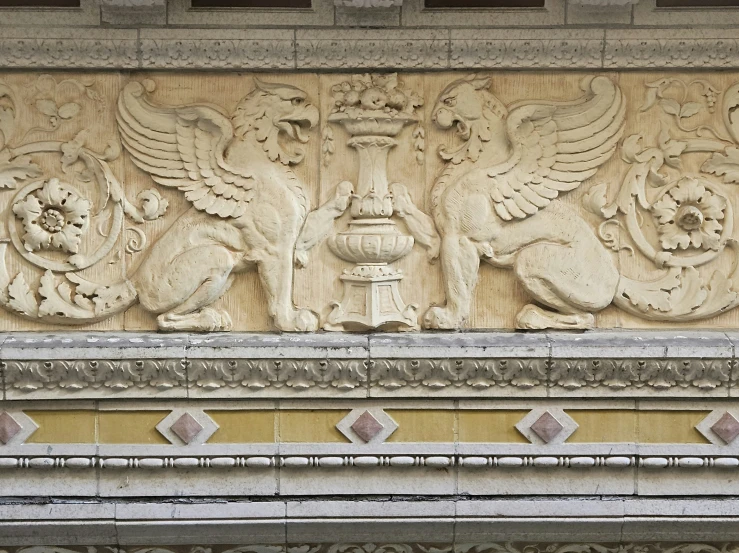 ornate carvings on the front and wall of an ornate building