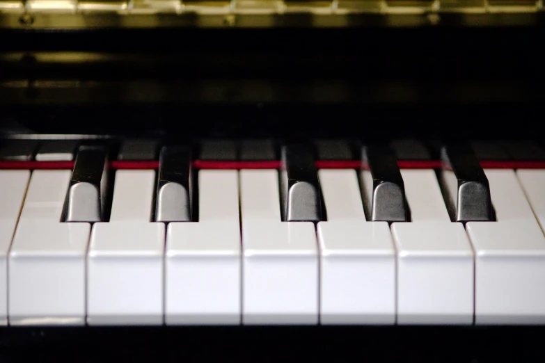 an image of a piano keyboard that is on the floor