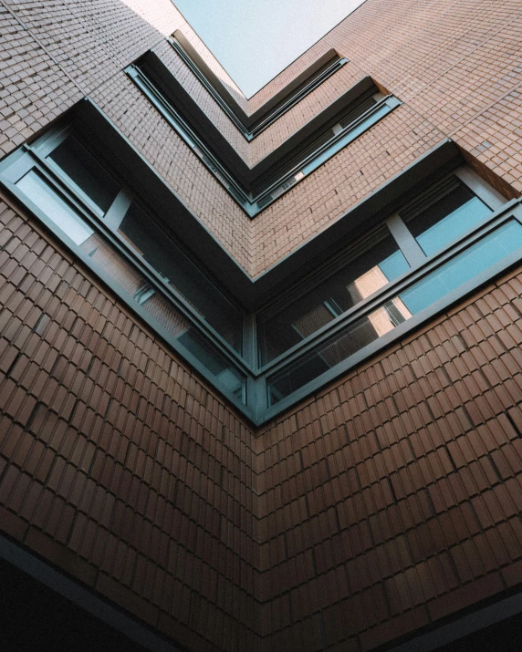 an image of some brick buildings and a skateboard