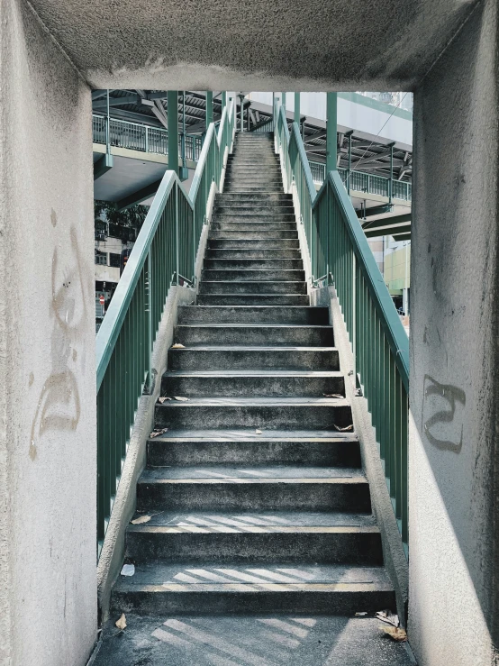 stairs going down an abandoned concrete building