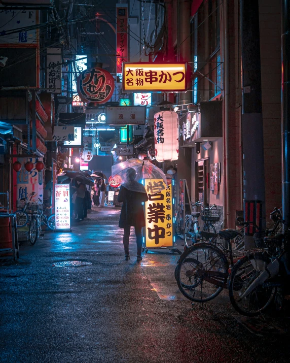 a man with an umbrella walks in the rain in the city