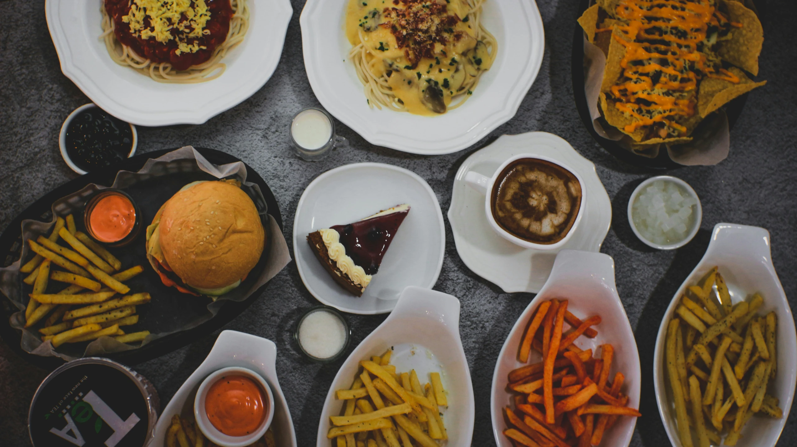 several plates filled with different types of food