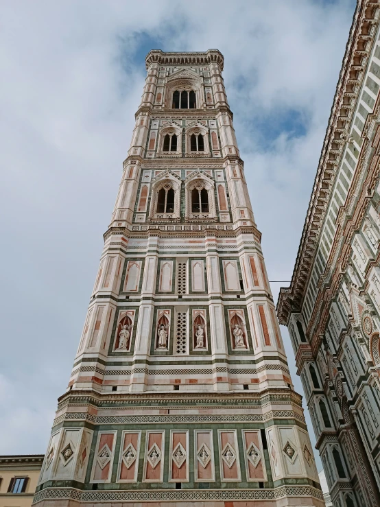 a big tower with a clock on the side