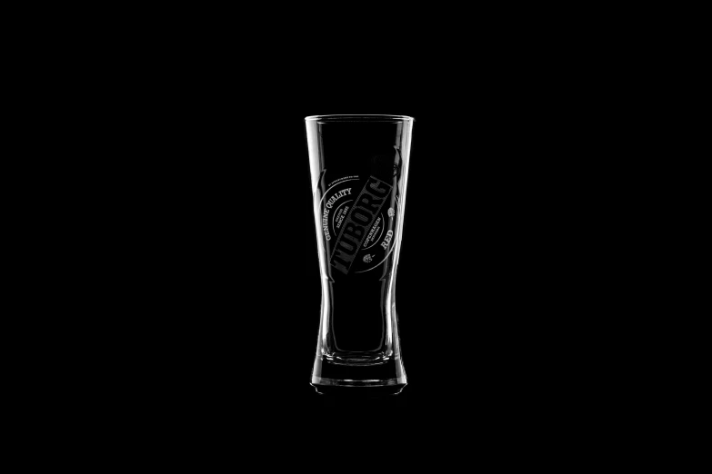 a glass with a logo on the side is shown