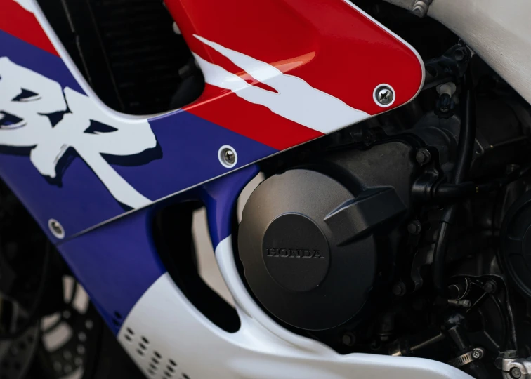 an up close s of the rear end of a racing motorcycle