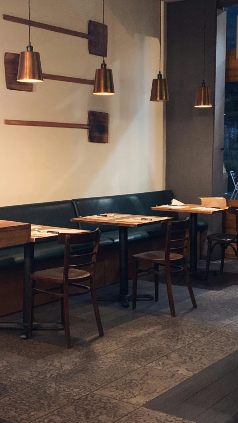 a restaurant setting with three different seating areas and no one in it