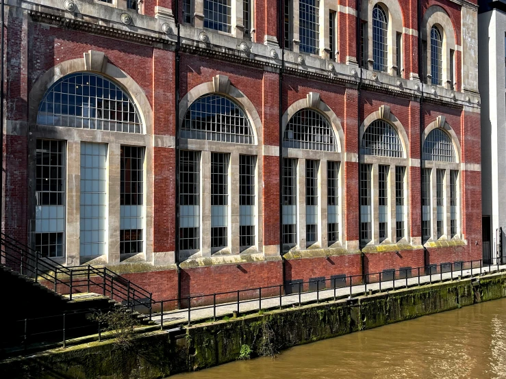 a building in the city with a red brick color